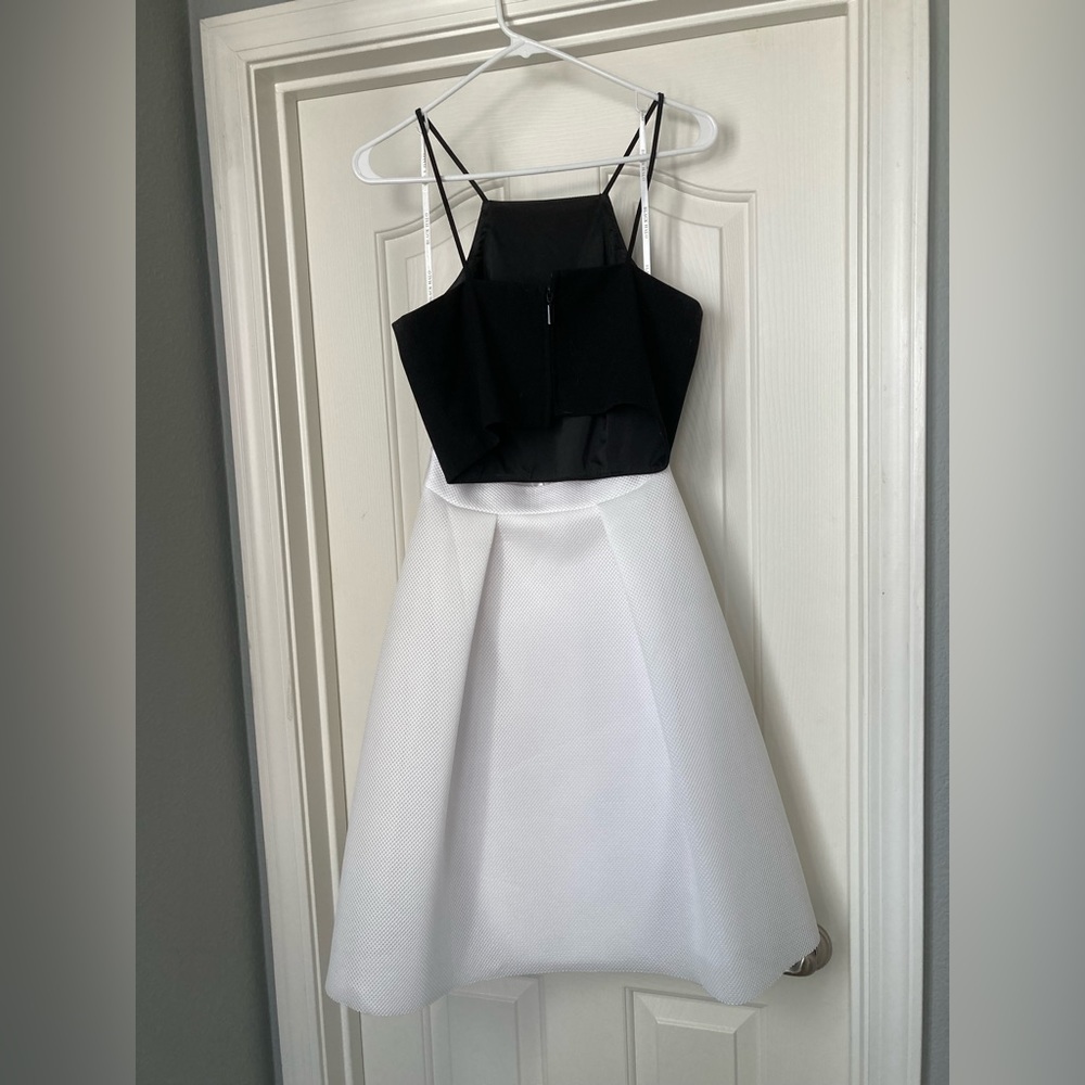 Used black halo crop top and skirt. - Picture 2 of 3